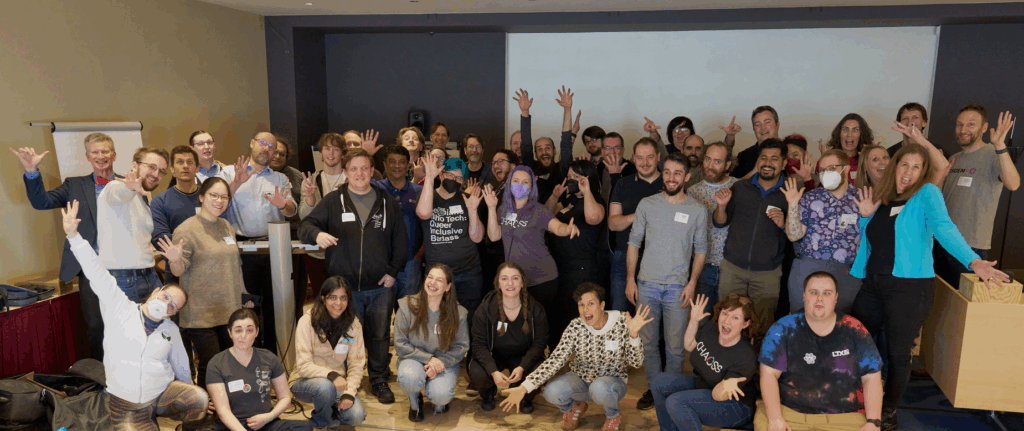 A bunch of people having a great time in a fun picture from CHAOSScon EU